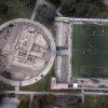 A soccer field built extremely close to the remains of the Huaca La Luz in Lima; photo: AP