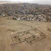 Houses built most probably on top of age-old structures are extremely close to still visible ancient ruins at the archaeological complex of Pachacamac, Lurin, Lima; photo: AP